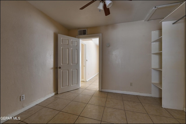 2619 Piedras St Unit A, And B, El Paso, TX 79930 - spare room featuring a ceiling fan, light tile patterned floors, baseboards, and a textured wall