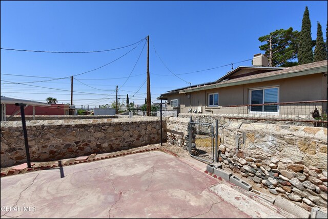 2619 Piedras St Unit A, And B, El Paso, TX 79930 - view of patio / terrace featuring a gate