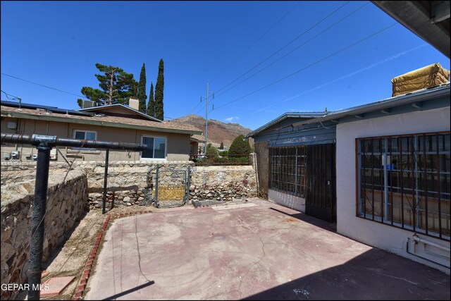 2619 Piedras St Unit A, And B, El Paso, TX 79930 - view of patio / terrace featuring a gate