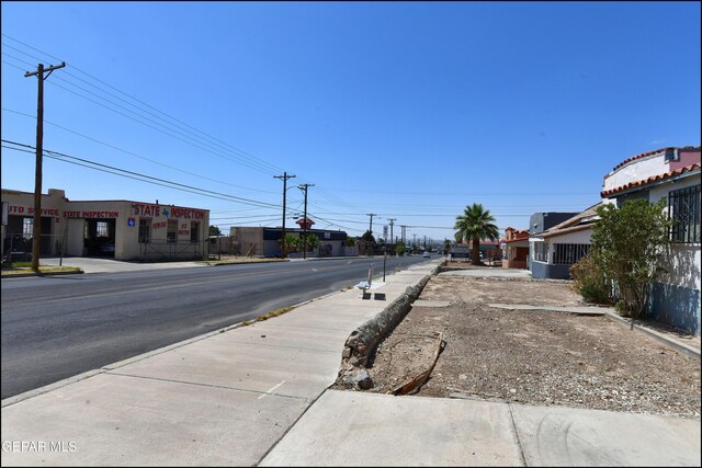 2619 Piedras St Unit A, And B, El Paso, TX 79930 - view of asphalt road featuring sidewalks and curbs