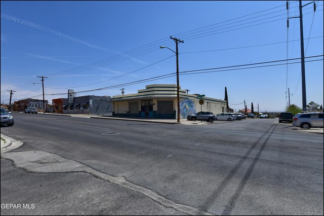 2619 Piedras St Unit A, And B, El Paso, TX 79930 - view of asphalt street featuring street lights, curbs, and sidewalks