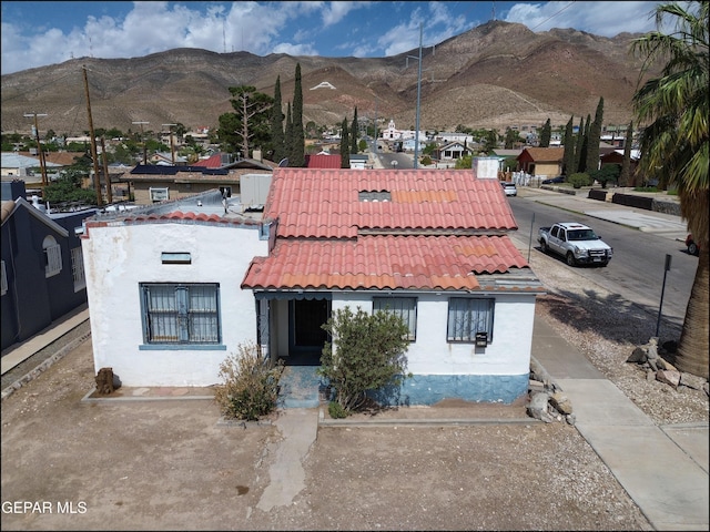 2619 Piedras St Unit A, And B, El Paso, TX 79930 - view of front of property with a tiled roof, a mountain view, and stucco siding