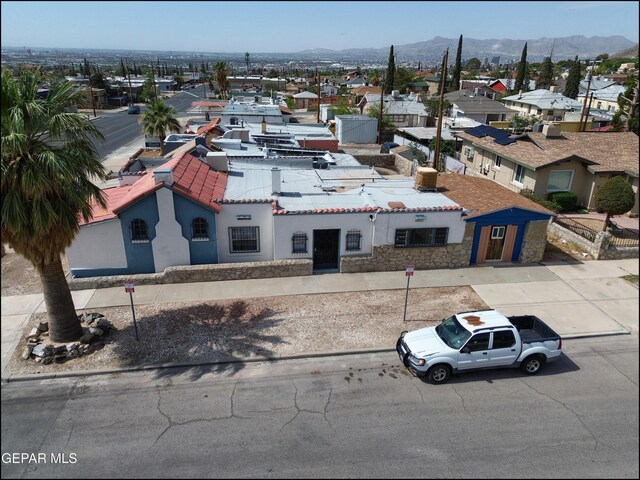 2619 Piedras St Unit A, And B, El Paso, TX 79930 - aerial perspective of suburban area featuring mountains