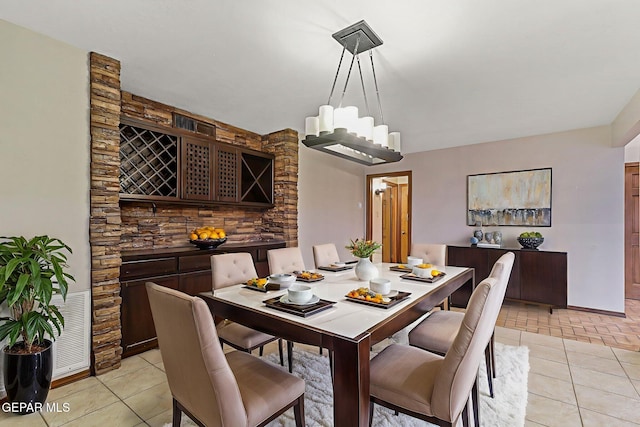 1433 Belvidere St, El Paso, TX 79912 - dining space with light tile patterned floors and baseboards
