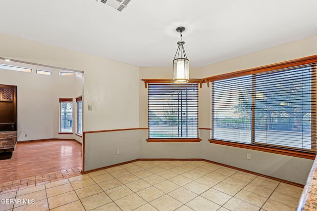 1433 Belvidere St, El Paso, TX 79912 - empty room featuring baseboards and light tile patterned flooring