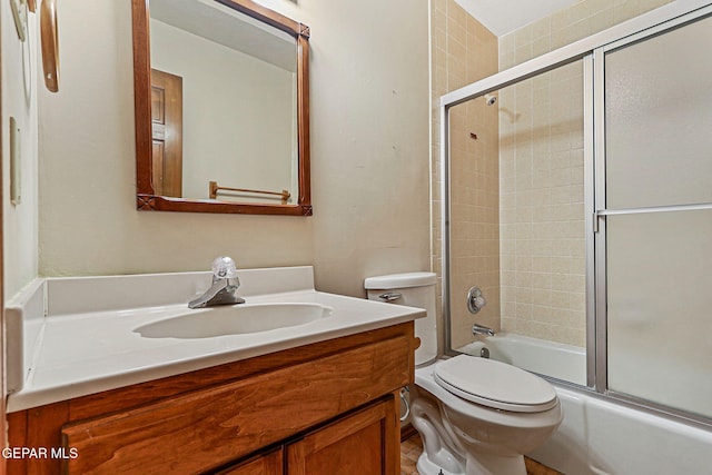 1433 Belvidere St, El Paso, TX 79912 - full bath featuring vanity, toilet, and bath / shower combo with glass door