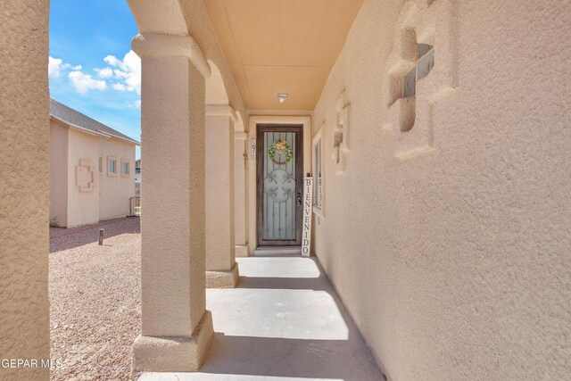 14250 Charles Pollock Ave, El Paso, TX 79938 - entrance to property with stucco siding
