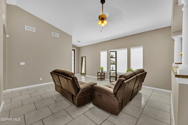 14250 Charles Pollock Ave, El Paso, TX 79938 - living area with ceiling fan, light tile patterned flooring, and baseboards