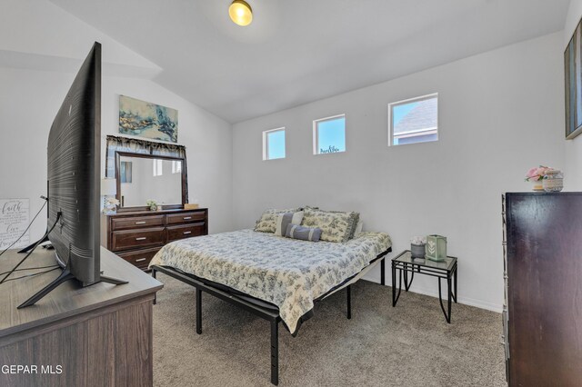 14250 Charles Pollock Ave, El Paso, TX 79938 - bedroom with carpet, vaulted ceiling, and baseboards