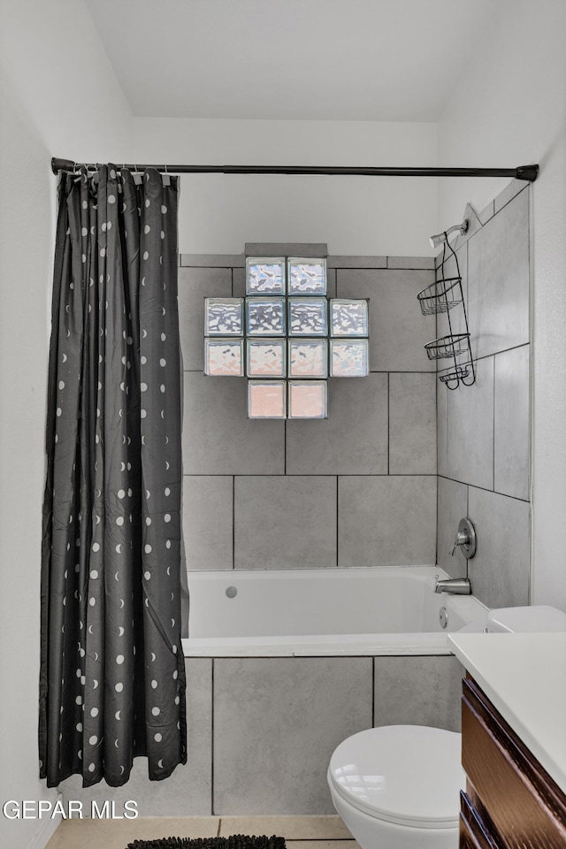 14250 Charles Pollock Ave, El Paso, TX 79938 - bathroom featuring toilet, shower / bathtub combination with curtain, and vanity