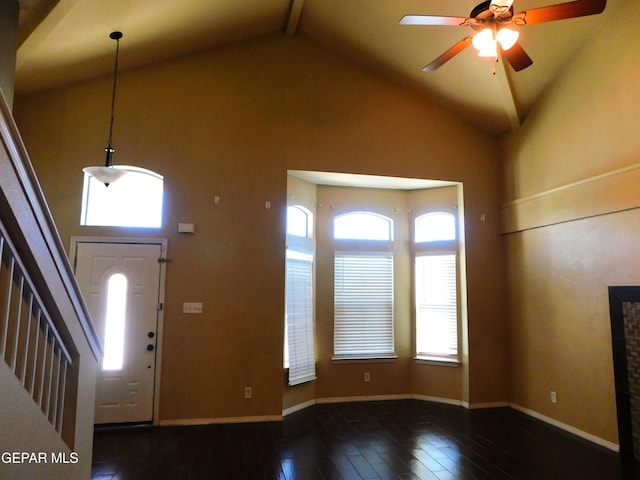 11233 Red Barrel Pl, El Paso, TX 79934 - foyer entrance with high vaulted ceiling, ceiling fan, hardwood / wood-style floors, baseboards, and stairs