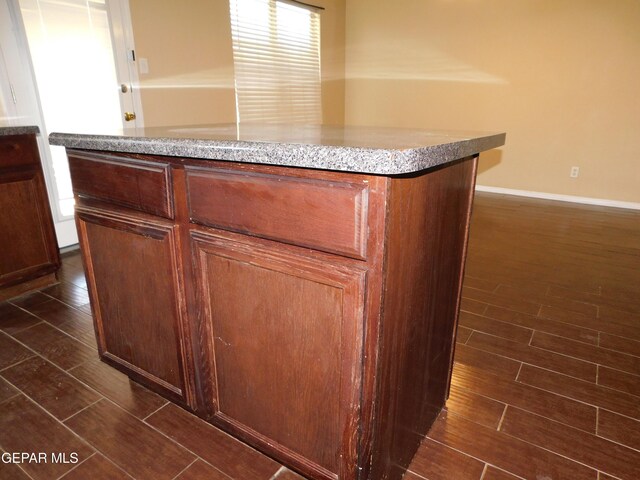 11233 Red Barrel Pl, El Paso, TX 79934 - detailed view of wood finished floors and baseboards