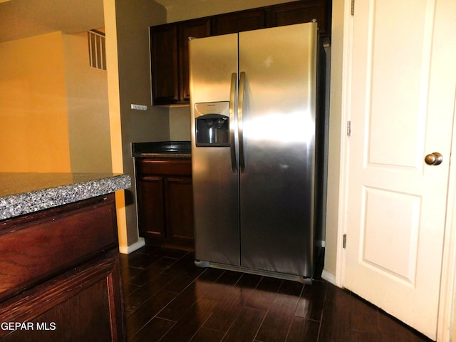 11233 Red Barrel Pl, El Paso, TX 79934 - kitchen with stainless steel fridge, baseboards, and dark wood-type flooring