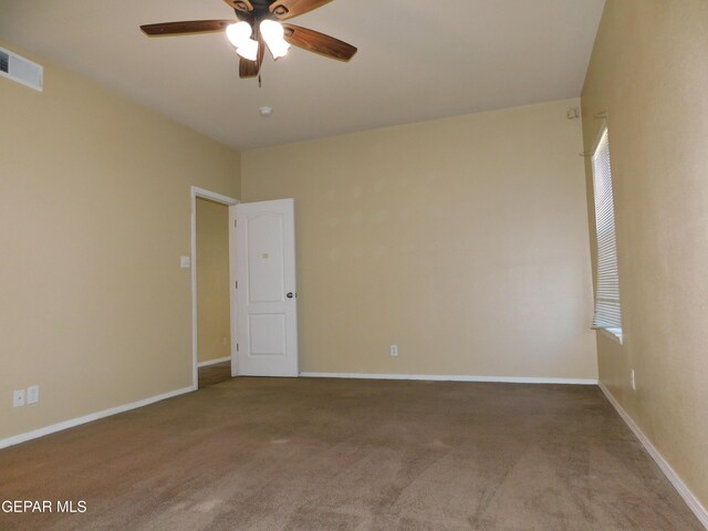 11233 Red Barrel Pl, El Paso, TX 79934 - carpeted spare room with ceiling fan and baseboards