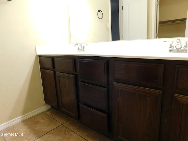 11233 Red Barrel Pl, El Paso, TX 79934 - bathroom featuring double vanity, tile patterned flooring, and baseboards
