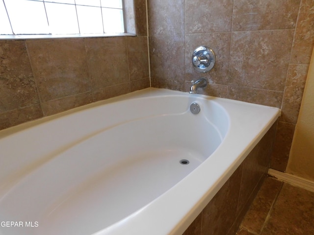 11233 Red Barrel Pl, El Paso, TX 79934 - full bath with tiled tub and tile patterned floors