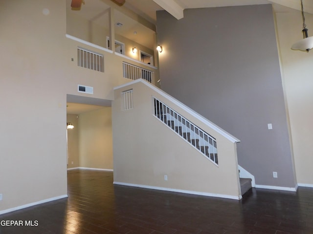11233 Red Barrel Pl, El Paso, TX 79934 - staircase with high vaulted ceiling, hardwood / wood-style flooring, baseboards, beamed ceiling, and ceiling fan