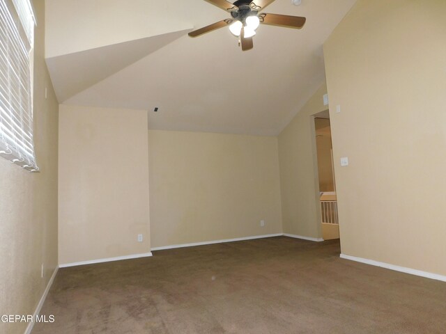 11233 Red Barrel Pl, El Paso, TX 79934 - additional living space with ceiling fan, carpet flooring, vaulted ceiling, and baseboards