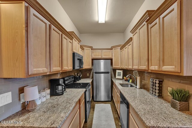 6350 Escondido Dr Unit A24, El Paso, TX 79912 - kitchen featuring stainless steel appliances, a sink, and backsplash