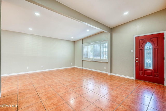 3223 Suffolk Rd, El Paso, TX 79925 - foyer with lofted ceiling, light tile patterned floors, and recessed lighting