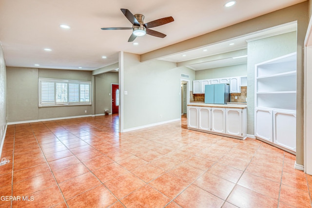 3223 Suffolk Rd, El Paso, TX 79925 - unfurnished living room featuring light tile patterned floors, recessed lighting, a ceiling fan, and beam ceiling