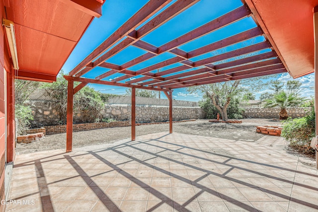 3223 Suffolk Rd, El Paso, TX 79925 - fenced backyard with a pergola and a patio
