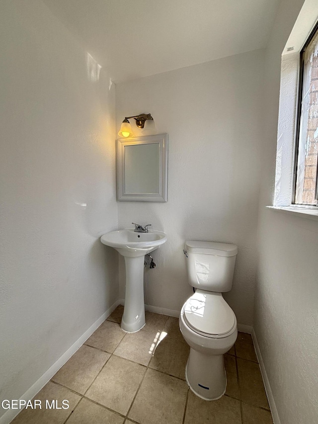 5808 Dearborne Dr, El Paso, TX 79924 - half bathroom with tile patterned floors