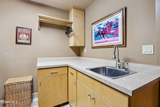 5744 Mira Grande Dr, El Paso, TX 79912 - kitchen with a sink, light brown cabinetry, and light countertops