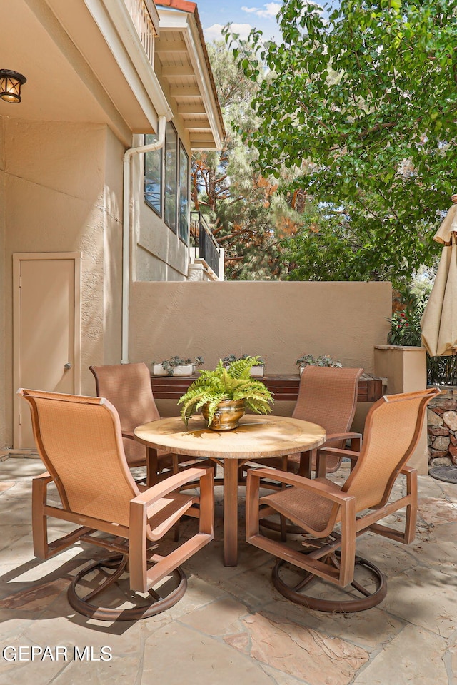 5744 Mira Grande Dr, El Paso, TX 79912 - view of patio featuring outdoor dining area