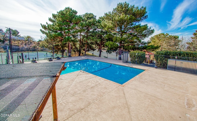 5744 Mira Grande Dr, El Paso, TX 79912 - community pool with a patio area
