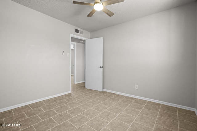 9606 Bahamas St, El Paso, TX 79927 - spare room featuring a textured ceiling and a ceiling fan