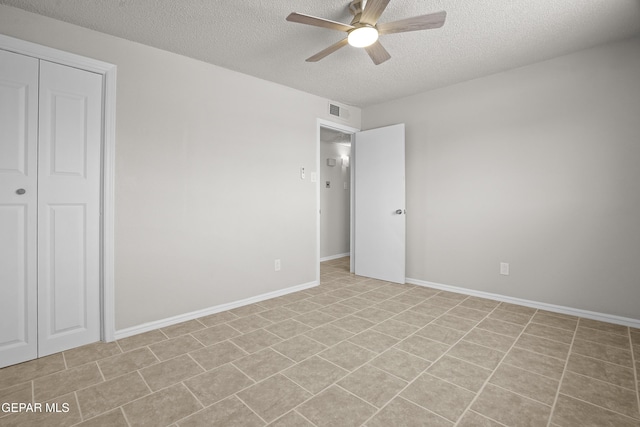 9606 Bahamas St, El Paso, TX 79927 - unfurnished bedroom with a textured ceiling and a ceiling fan