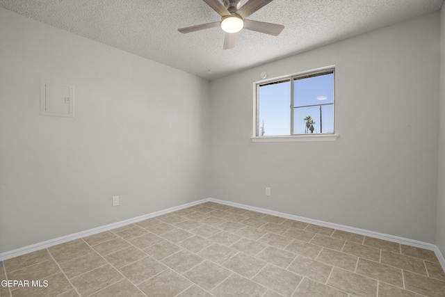 9606 Bahamas St, El Paso, TX 79927 - spare room featuring a textured ceiling, ceiling fan, and electric panel