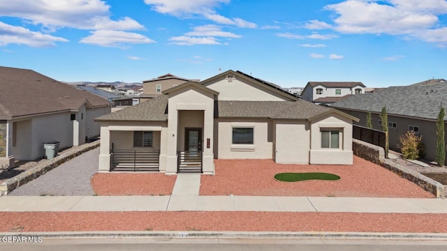 2816 Mike Price Dr, El Paso, TX 79938 - view of front of home featuring stucco siding, a residential view, and a shingled roof