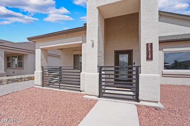 2816 Mike Price Dr, El Paso, TX 79938 - view of exterior entry featuring stucco siding