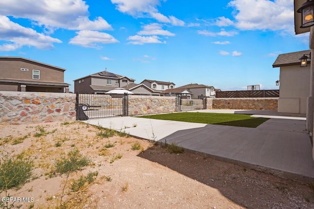 2816 Mike Price Dr, El Paso, TX 79938 - fenced yard featuring a gate and a residential view