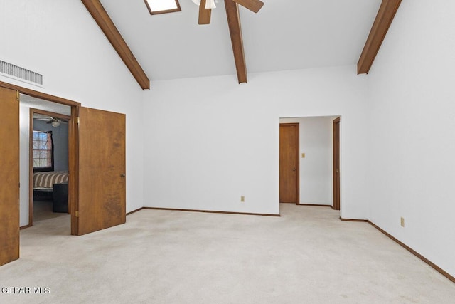 6735 Camino Fuente Dr, El Paso, TX 79912 - unfurnished bedroom with light colored carpet, baseboards, and a ceiling fan