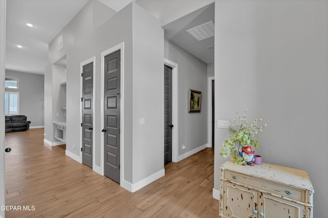 14405 Tierra Campeon, El Paso, TX 79938 - hallway featuring built in features, baseboards, recessed lighting, and light wood finished floors