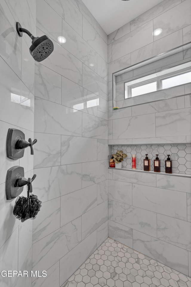 14405 Tierra Campeon, El Paso, TX 79938 - bathroom featuring a tile shower