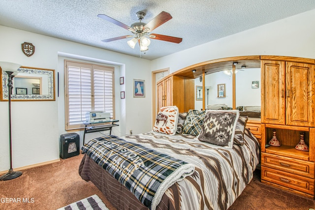 1809 Garden Gate Way, El Paso, TX 79936 - bedroom featuring carpet floors, a textured ceiling, arched walkways, and a ceiling fan