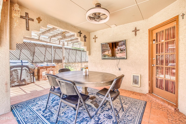 1809 Garden Gate Way, El Paso, TX 79936 - dining room featuring a textured wall, ceiling fan, and tile patterned floors