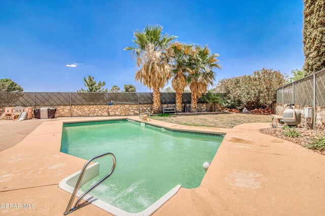 1809 Garden Gate Way, El Paso, TX 79936 - view of swimming pool with a fenced backyard and a patio