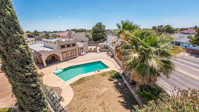 1809 Garden Gate Way, El Paso, TX 79936 - swimming pool featuring a patio and a fenced backyard
