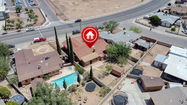 10749 Rushing Rd, El Paso, TX 79924 - aerial perspective of suburban area with a pool