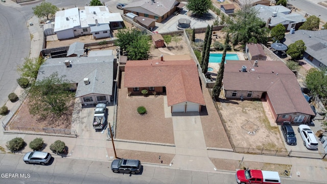 10749 Rushing Rd, El Paso, TX 79924 - aerial perspective of suburban area featuring a pool
