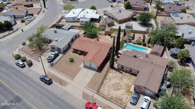 10749 Rushing Rd, El Paso, TX 79924 - aerial perspective of suburban area with a pool
