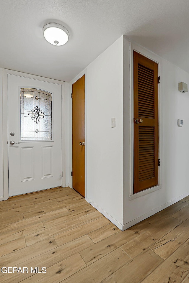 10749 Rushing Rd, El Paso, TX 79924 - entryway with light wood-style floors