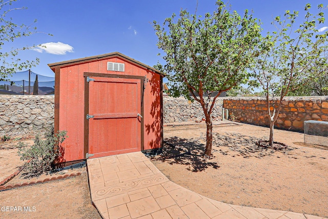 10749 Rushing Rd, El Paso, TX 79924 - view of shed featuring a fenced backyard