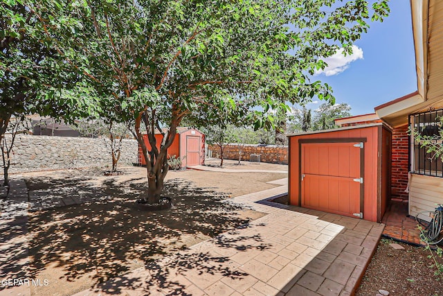 10749 Rushing Rd, El Paso, TX 79924 - fenced backyard featuring a patio area