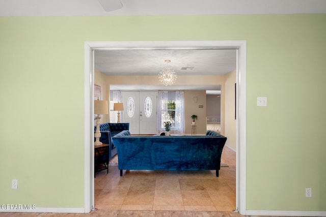8820 Dirk Ct, El Paso, TX 79925 - living room featuring a chandelier